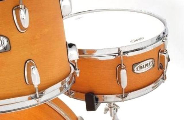 blank The snare rustles up a crisp, sweet response.